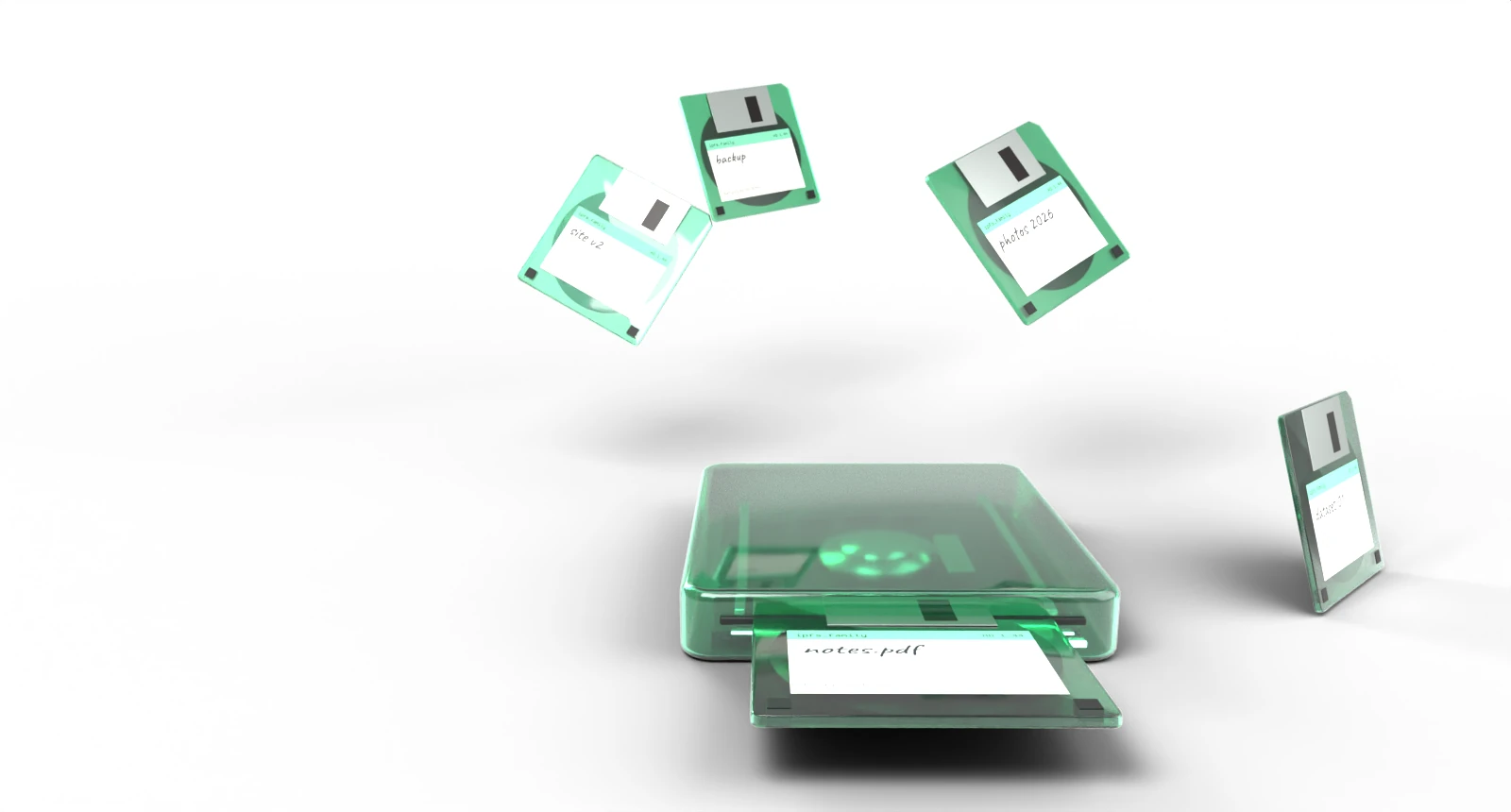 A clear mint floppy disk sliding into a clear drive